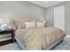 King-size bed and neutral decor in a spacious bedroom at 3213 W Fair Oaks Ave, Tampa, FL 33611