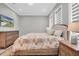 Spacious bedroom with king-size bed and ensuite bathroom at 3213 W Fair Oaks Ave, Tampa, FL 33611