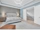 Spacious bedroom with plush bed and neutral decor at 3213 W Fair Oaks Ave, Tampa, FL 33611