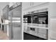Modern kitchen with stainless steel appliances and built in oven at 3213 W Fair Oaks Ave, Tampa, FL 33611