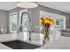 Modern kitchen with a large island and a stylish faucet at 3213 W Fair Oaks Ave, Tampa, FL 33611