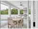 Outdoor kitchen and dining area with built-in grill at 3213 W Fair Oaks Ave, Tampa, FL 33611