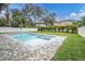 Relaxing rectangular pool with a spa and brick pavers at 3213 W Fair Oaks Ave, Tampa, FL 33611