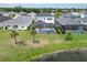 Two-story home with pool and lake view at 3322 Woodmont Dr, Parrish, FL 34219
