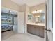 Elegant bathroom with gray vanity and marble flooring at 3322 Woodmont Dr, Parrish, FL 34219