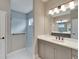 Bathroom with a walk-in shower and marble tile at 3322 Woodmont Dr, Parrish, FL 34219