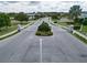 Gated community entrance with landscaping at 3322 Woodmont Dr, Parrish, FL 34219