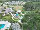 Aerial view of playground, park, and walking paths at 3322 Woodmont Dr, Parrish, FL 34219