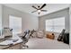 Bright home office with built-in desk and seating at 3322 Woodmont Dr, Parrish, FL 34219