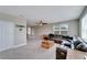 Spacious living room with a comfortable sectional sofa at 3322 Woodmont Dr, Parrish, FL 34219