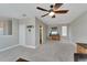 Relaxing living room with a sectional sofa and TV at 3322 Woodmont Dr, Parrish, FL 34219