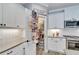 Well-organized pantry with ample shelving for storage at 3322 Woodmont Dr, Parrish, FL 34219