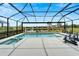 Relaxing pool and spa with lake view at 3322 Woodmont Dr, Parrish, FL 34219
