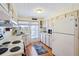 Bright kitchen with ample counter space and wood cabinets at 35138 Dale Ave, Zephyrhills, FL 33541