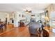 Spacious living room with hardwood floors and open concept to kitchen at 35138 Dale Ave, Zephyrhills, FL 33541