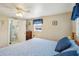 Spacious main bedroom with large bed and en-suite bathroom at 35138 Dale Ave, Zephyrhills, FL 33541