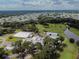 Aerial view of the golf course clubhouse and surrounding area at 36819 Kiowa Ave, Zephyrhills, FL 33542