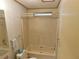Clean bathroom with shower/tub combo and updated vanity at 36819 Kiowa Ave, Zephyrhills, FL 33542