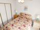 Bedroom with double bed, nightstands, and mirrored closet at 36819 Kiowa Ave, Zephyrhills, FL 33542