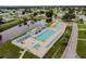 Aerial view of community pool with surrounding lounge area at 36819 Kiowa Ave, Zephyrhills, FL 33542
