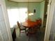 Cozy dining area with a round table and four chairs at 36819 Kiowa Ave, Zephyrhills, FL 33542