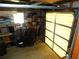 Garage with shelving, tools, and storage at 36819 Kiowa Ave, Zephyrhills, FL 33542