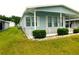 House exterior with carport and landscaping at 36819 Kiowa Ave, Zephyrhills, FL 33542