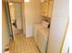 Laundry room with washer, dryer, and cabinets at 36819 Kiowa Ave, Zephyrhills, FL 33542