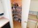 Well-stocked pantry with ample shelving for storage at 36819 Kiowa Ave, Zephyrhills, FL 33542