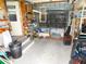 Workshop area with workbench and storage shelving at 36819 Kiowa Ave, Zephyrhills, FL 33542