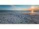 Scenic beach view at sunset, perfect for relaxing at 380 137Th Avenue Cir, Madeira Beach, FL 33708