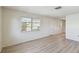 Spacious living area with hardwood floors and neutral walls at 380 137Th Avenue Cir, Madeira Beach, FL 33708