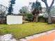 Large backyard with shed and grassy area at 4135 Helena Ne St, St Petersburg, FL 33703