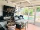 Florida room with seating and view of pool at 4135 Helena Ne St, St Petersburg, FL 33703