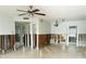 Living room undergoing renovation with exposed walls and flooring at 4135 Helena Ne St, St Petersburg, FL 33703