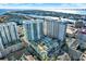 Aerial view showcasing building, pool, and waterfront at 450 Knights Run Ave # 605, Tampa, FL 33602