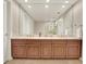 Double vanity bathroom with modern finishes and spacious layout at 450 Knights Run Ave # 605, Tampa, FL 33602