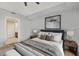 Bright bedroom with ensuite bathroom and hardwood floors at 450 Knights Run Ave # 605, Tampa, FL 33602