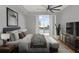 Spacious bedroom with city view, large bed, and ample natural light at 450 Knights Run Ave # 605, Tampa, FL 33602