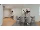Bright dining area with table and chairs, ready for entertaining at 450 Knights Run Ave # 605, Tampa, FL 33602