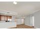 Modern kitchen with wood cabinets and a breakfast bar at 450 Knights Run Ave # 605, Tampa, FL 33602