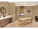 Spa-like massage room with a massage table and mirror at 450 Knights Run Ave # 605, Tampa, FL 33602