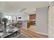 Open concept living and kitchen area with hardwood floors at 450 Knights Run Ave # 605, Tampa, FL 33602