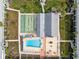 Complex overview showing pool, shuffleboard, and building layout at 4746 Azalea Dr # 203C, New Port Richey, FL 34652