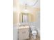 Clean bathroom with a white toilet, bathtub, and light wood vanity at 4746 Azalea Dr # 203C, New Port Richey, FL 34652