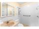 Accessible bathroom with shower, grab bars, and updated vanity at 4746 Azalea Dr # 203C, New Port Richey, FL 34652