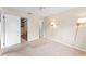 Bedroom with carpet, double door closet and access to another room and bathroom at 4746 Azalea Dr # 203C, New Port Richey, FL 34652