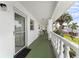 Clean and bright hallway with access to individual units at 4746 Azalea Dr # 203C, New Port Richey, FL 34652