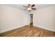 Bedroom with wood floors and closet at 546 Orangewood Dr, Dunedin, FL 34698