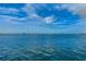 Calm water view with sailboats and blue skies at 546 Orangewood Dr, Dunedin, FL 34698